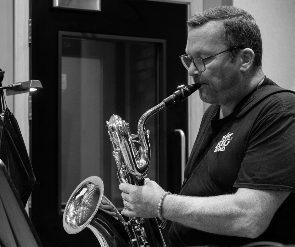 Saxophone player in That Big Band practicing music