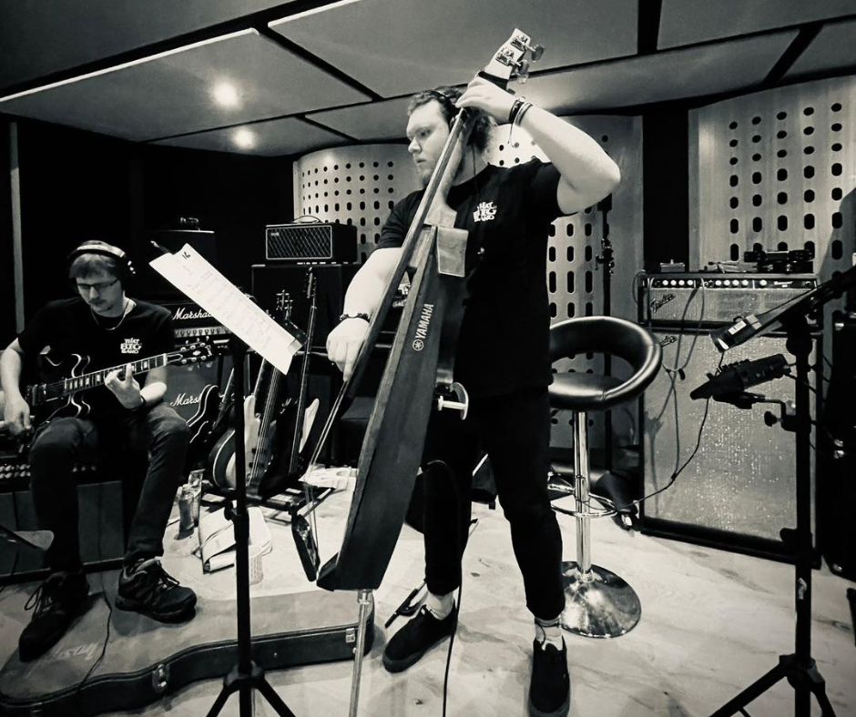 Cello player in That Big Band practicing music