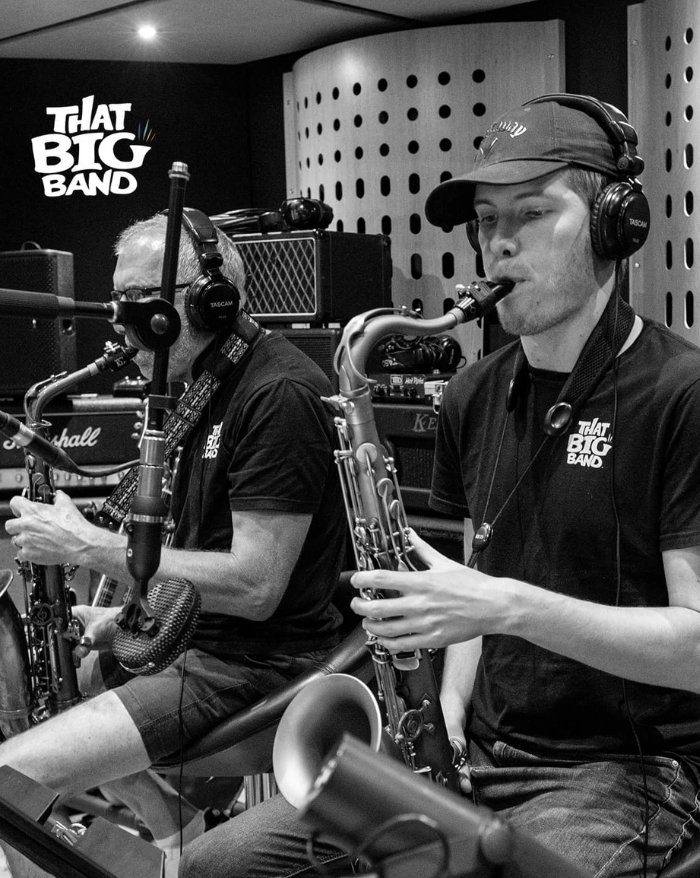 Saxophone players practising live big band music