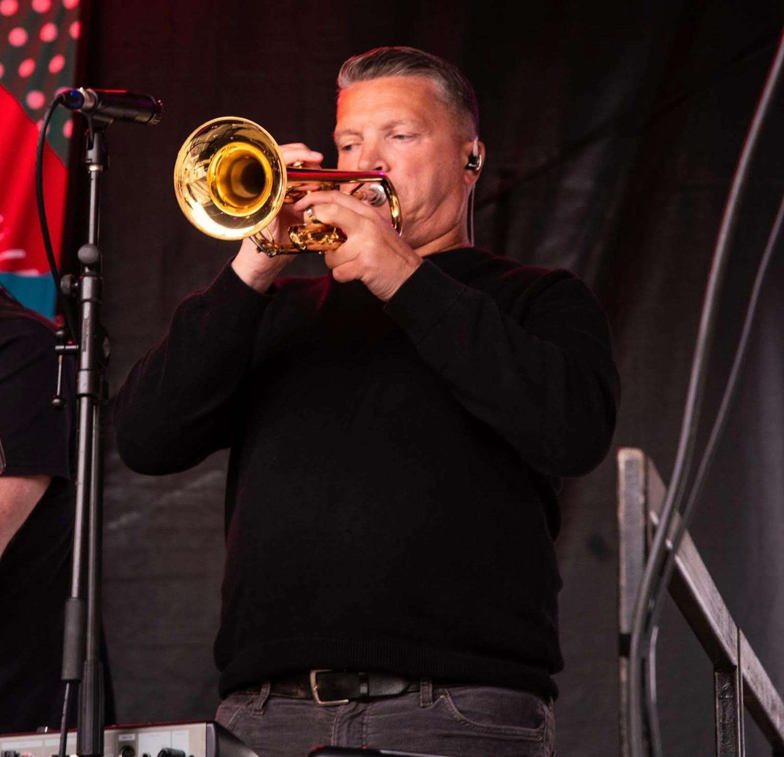 Tez Smith playing a trumpet